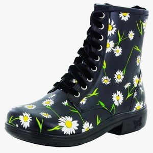 Alegria Ari combat boots with fun daisy pattern.  Leather upper. Never worn.